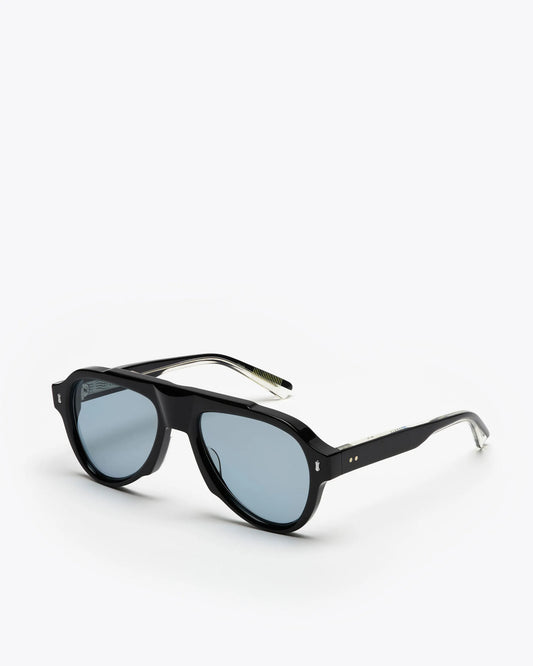 Aviator style sunglasses with black frames and blue lenses on a white background