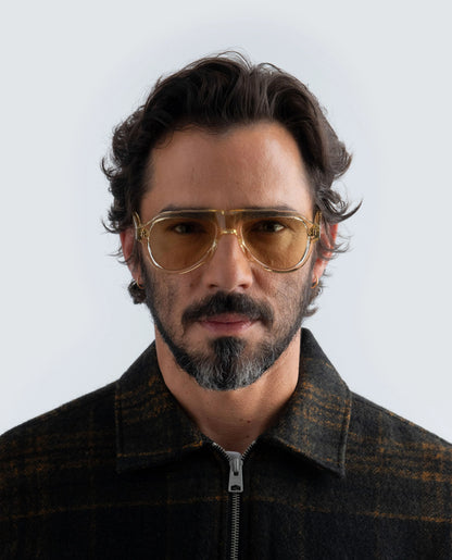 Man wearing Yellow Zephyr aviator sunglasses with a neutral background