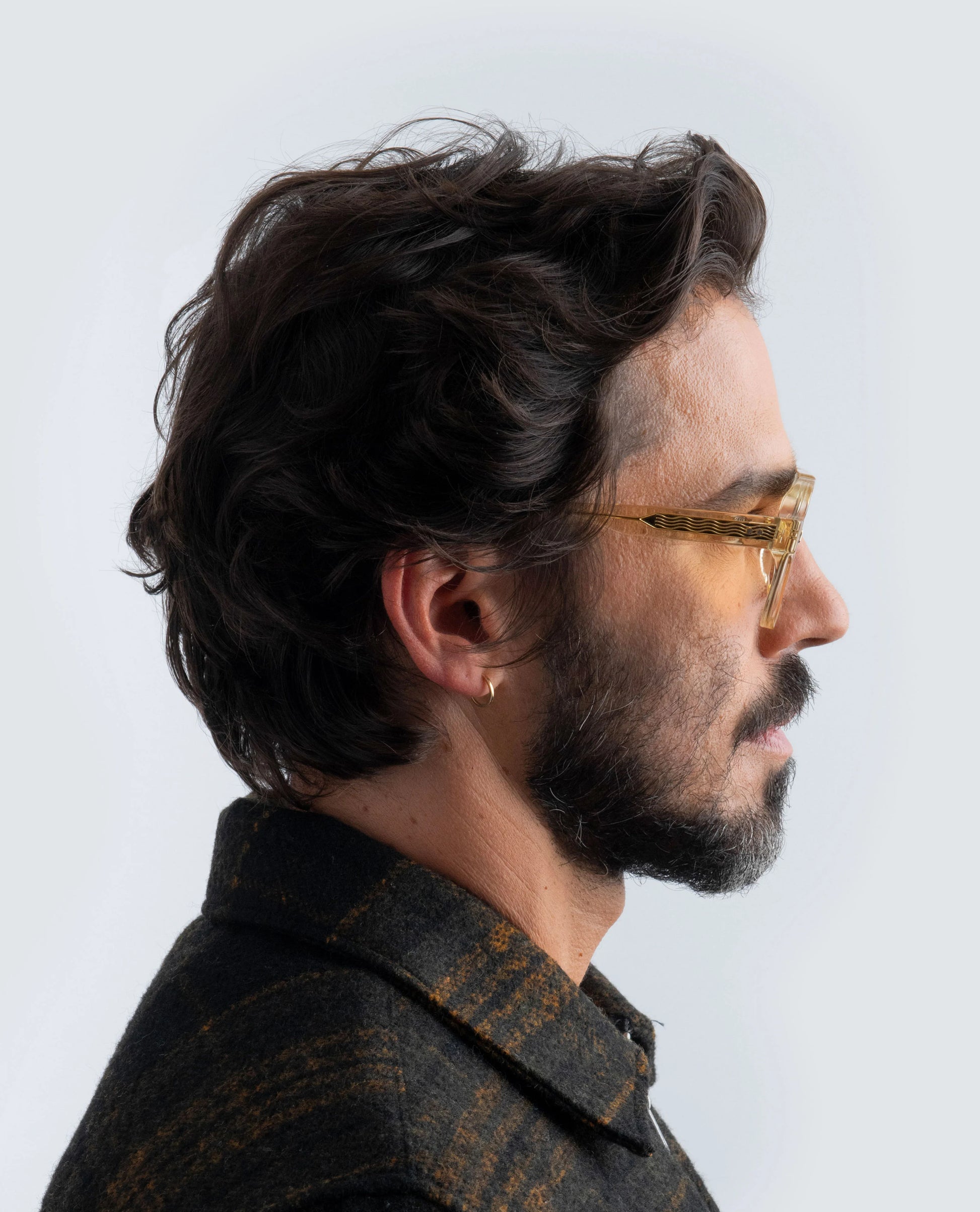 Man wearing Yellow Zephyr aviator sunglasses with a neutral background