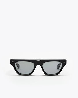 Black framed cat-eye sunglasses with grey lenses on a white background