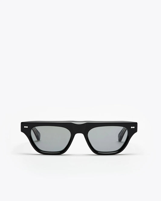 Black framed cat-eye sunglasses with grey lenses on a white background