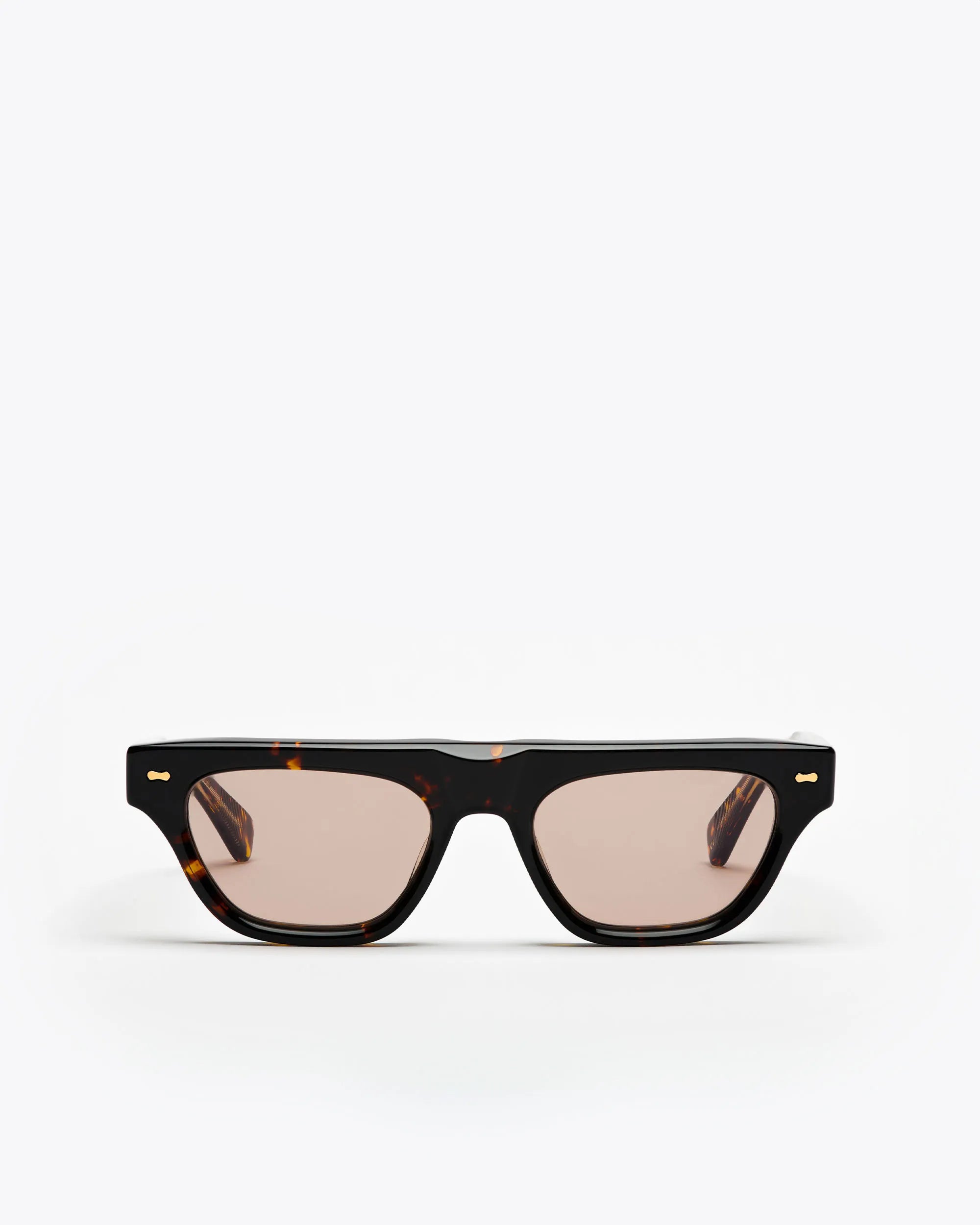 Cat-eye sunglasses with tortoiseshell frame and brown lenses on a white background