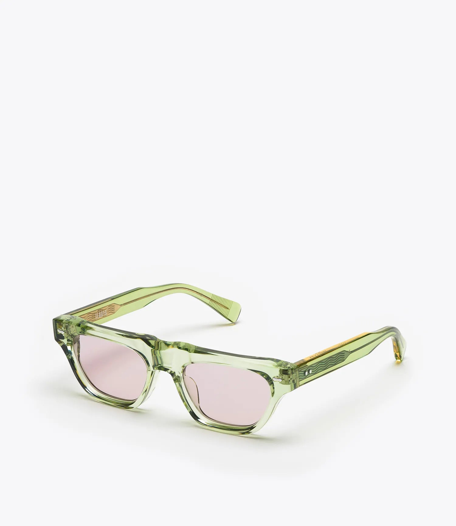 Seafoam green sunglasses with lilac lenses on a white background