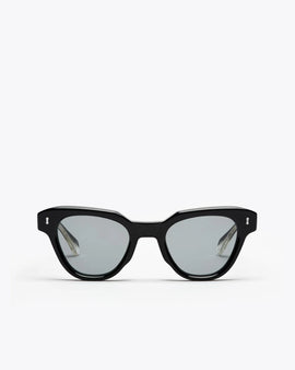 Black cat-eyesunglasses with grey lenses on a white background