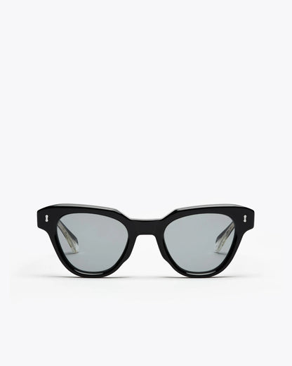 Black cat-eyesunglasses with grey lenses on a white background