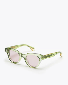 Seafoam green sunglasses with lilac lenses on a white background