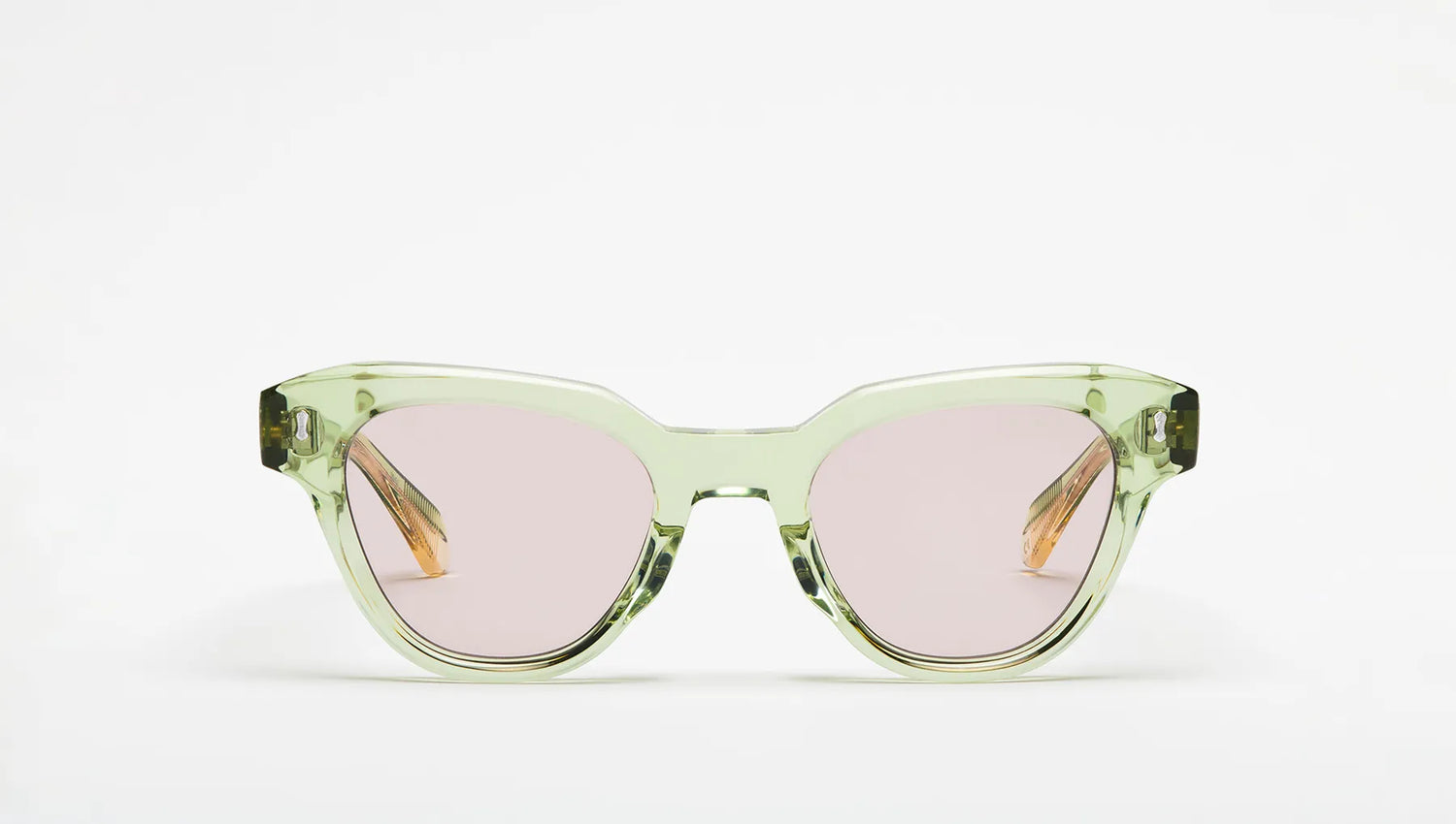 Seafoam green sunglasses with lilac lenses on a white background