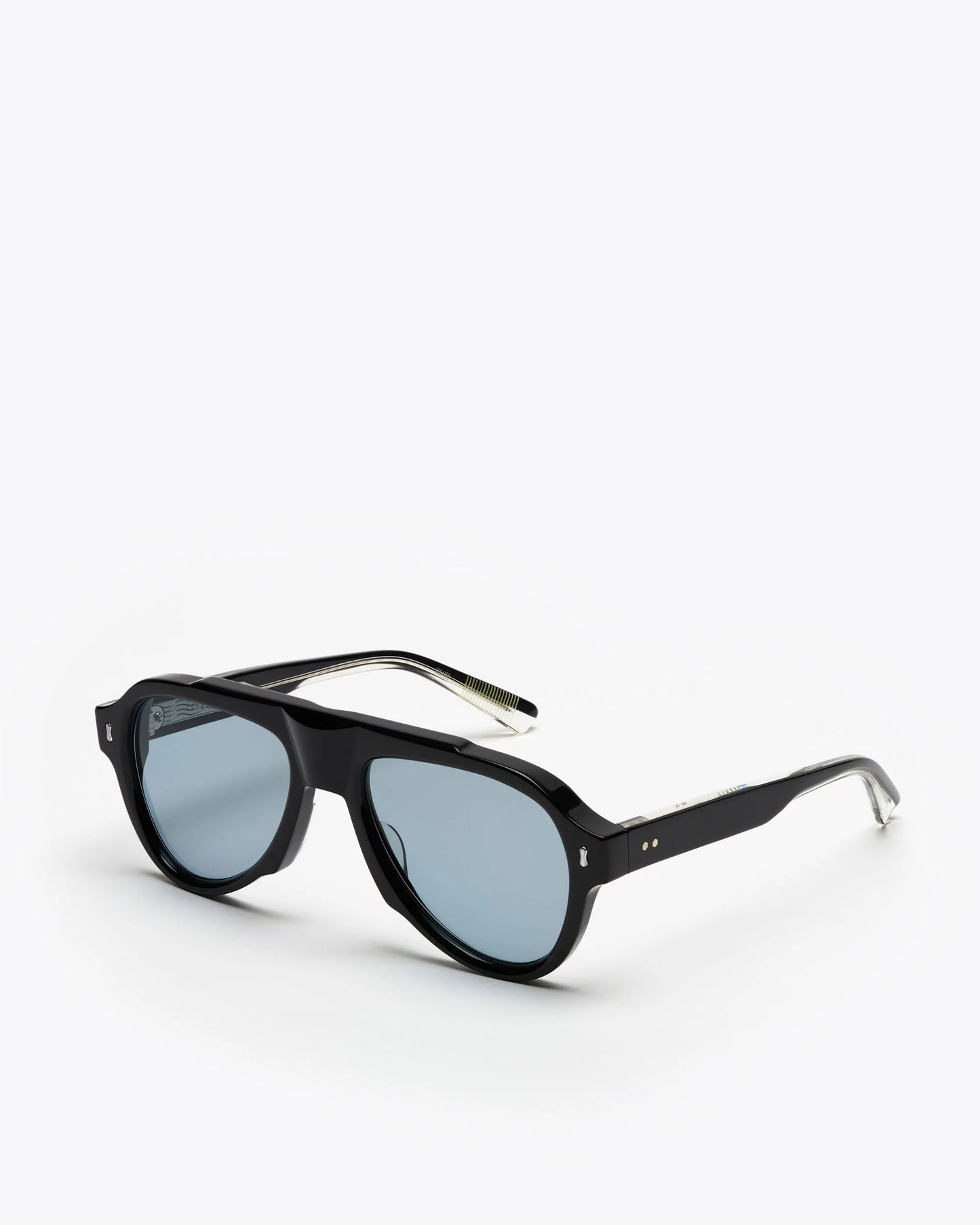 Aviator style sunglasses with black frames and blue lenses on a white background