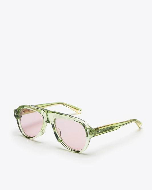Aviator style sunglasses with seafoam green frames and brown leses on a white background