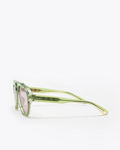 Aviator style sunglasses with seafoam green frames and brown leses on a white background